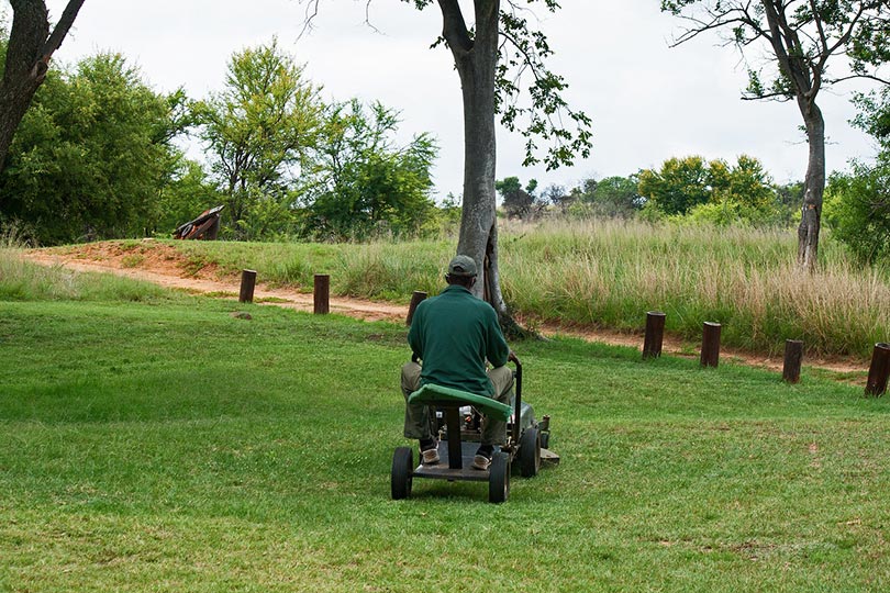 a man on a riding mower