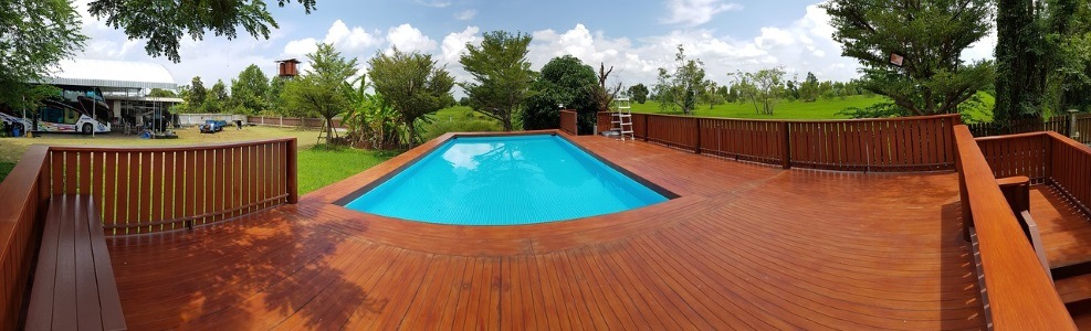 a wooden pool deck