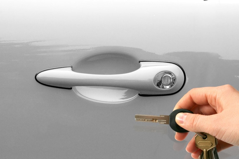 hand holding car keys