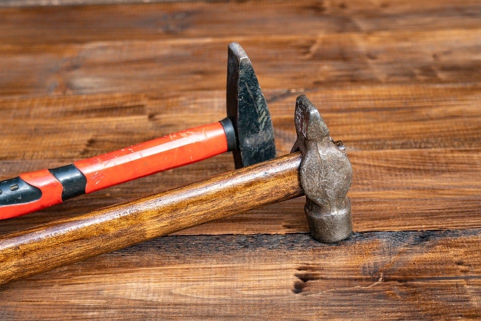 wood handle and steel handle hammers
